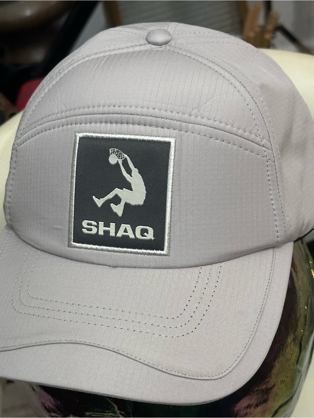 NWOT SHAQ light gray performance cap with embroidered logo